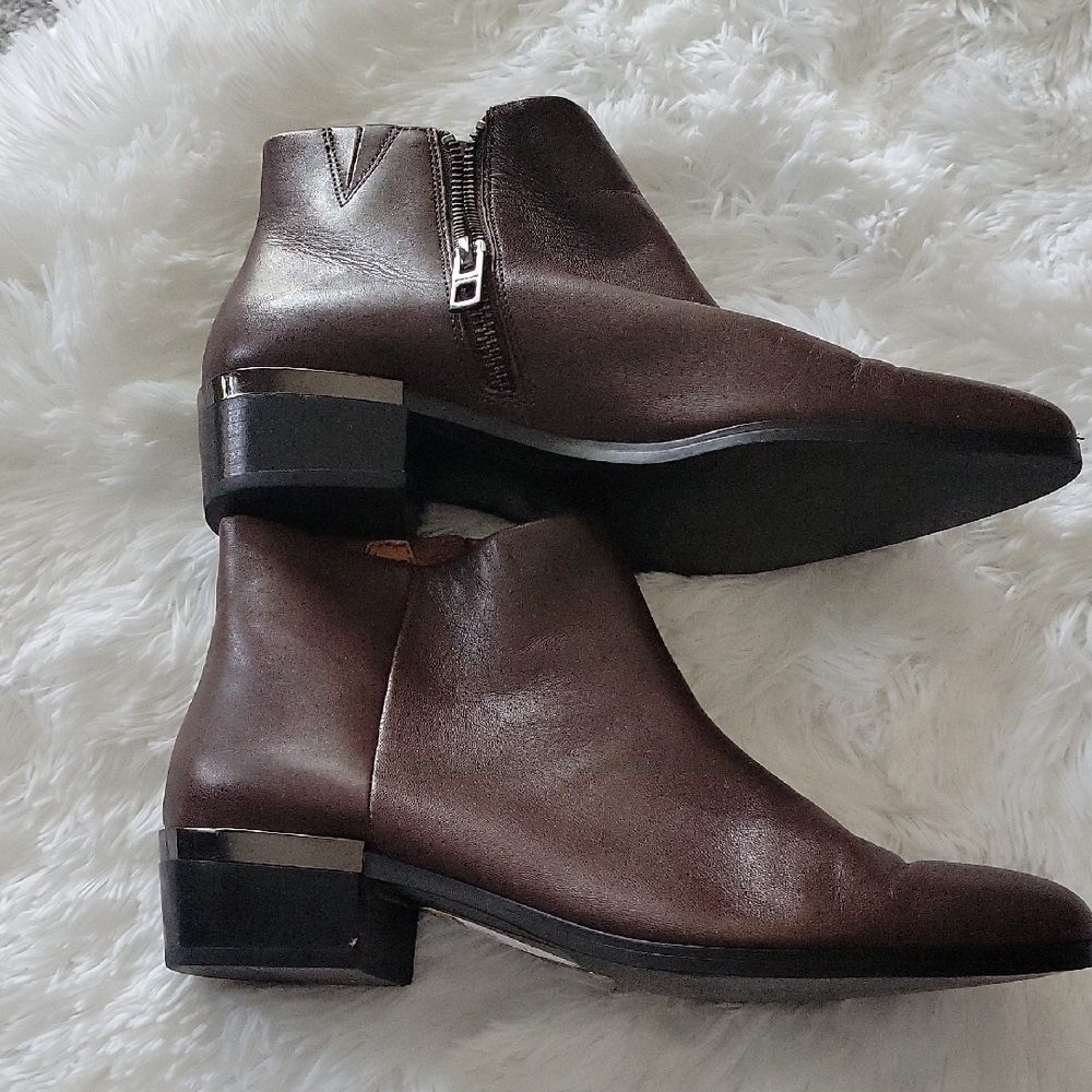 COACH Brown Leather Ankle Boots with Silver Accents.